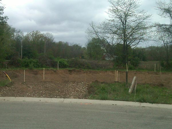 Strip and stake lot new home construction