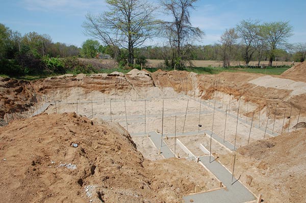 Pour footings new home construction