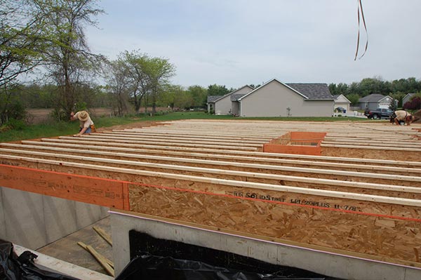 Install floor joists and framing